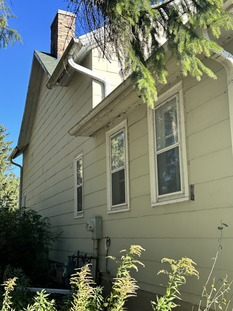 Exterior siding containing asbestos