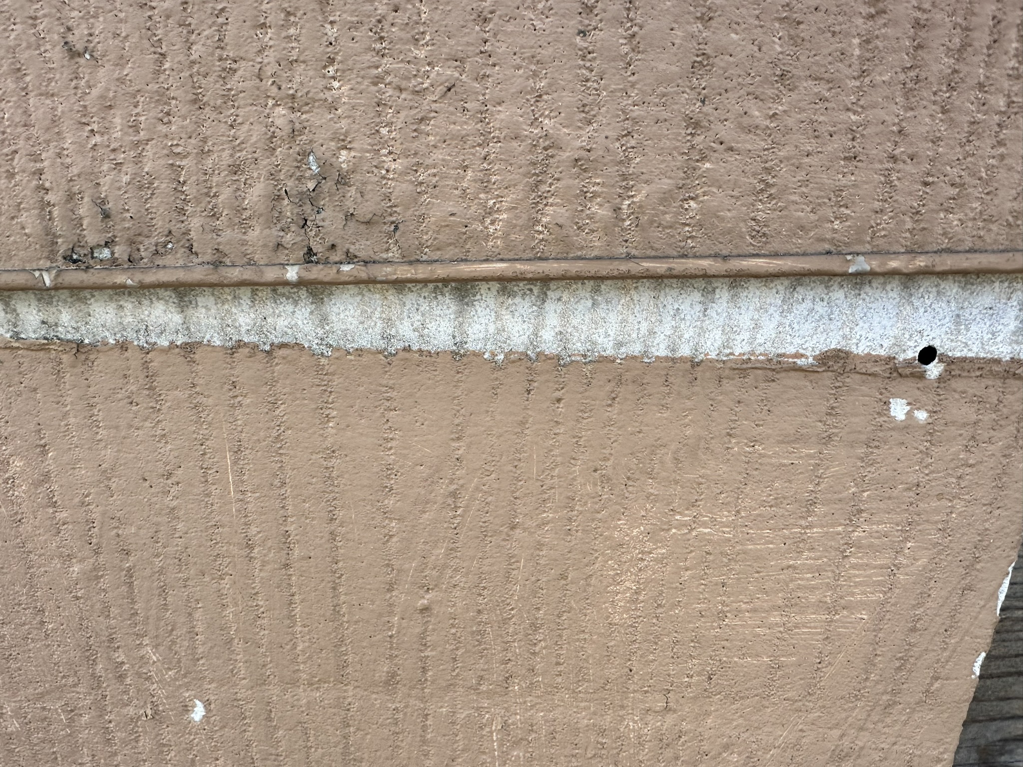 Lead-based paint on top of asbestos exterior siding